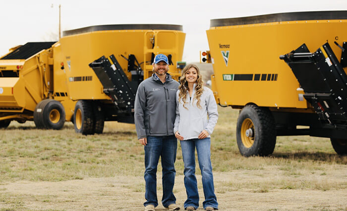 Owners of ZMill Inc Standing in front of Vermeer Equipment
